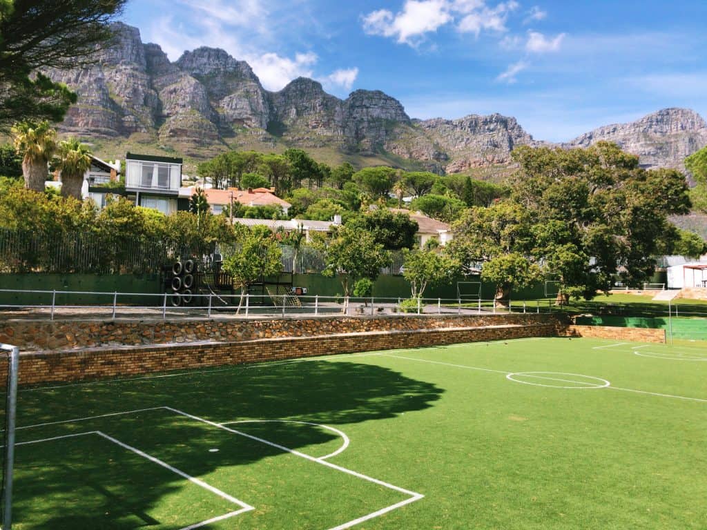 The five-a-side astroturf field at Camps Bay Primary, beneath the Twelve Apostles