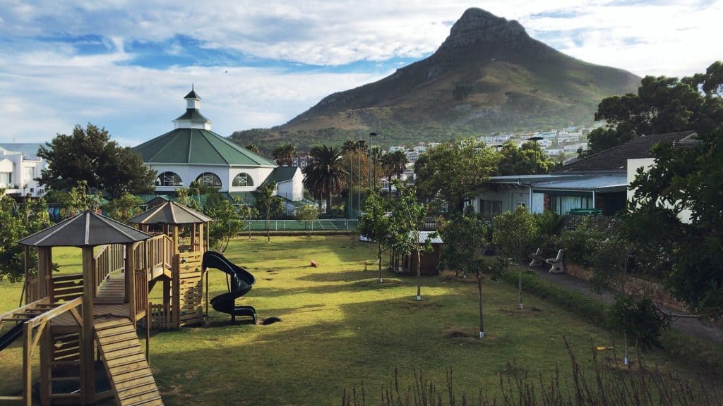 The Grade R campus play area at Camps Bay Primary, with Lion's Head behind