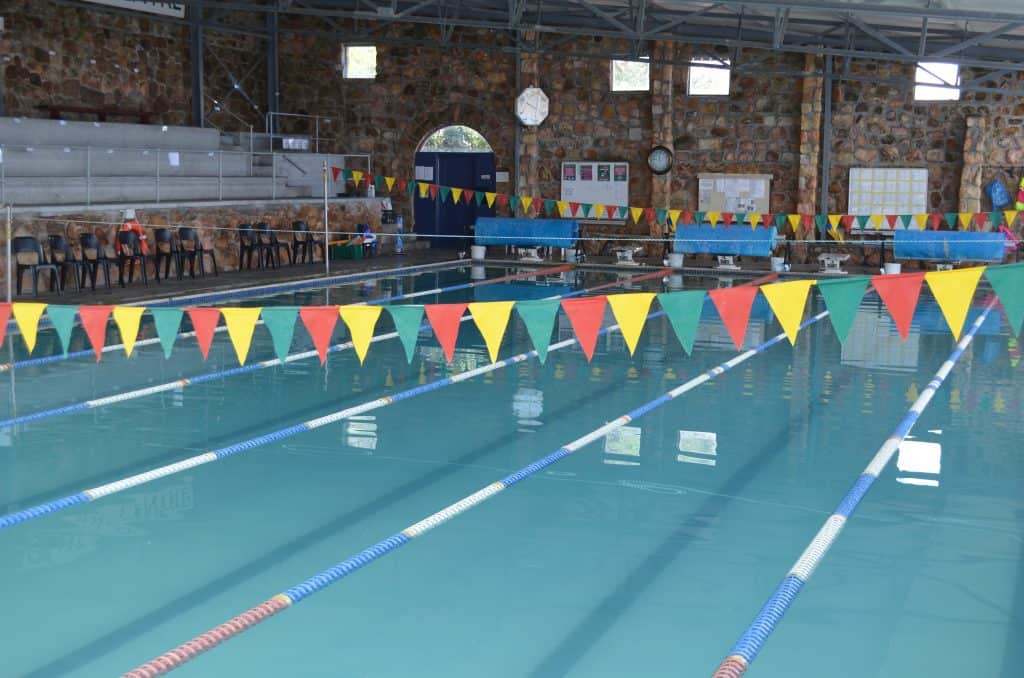 The indoor heated pool at the Wendy Way Aquatic Centre, decorated with bunting